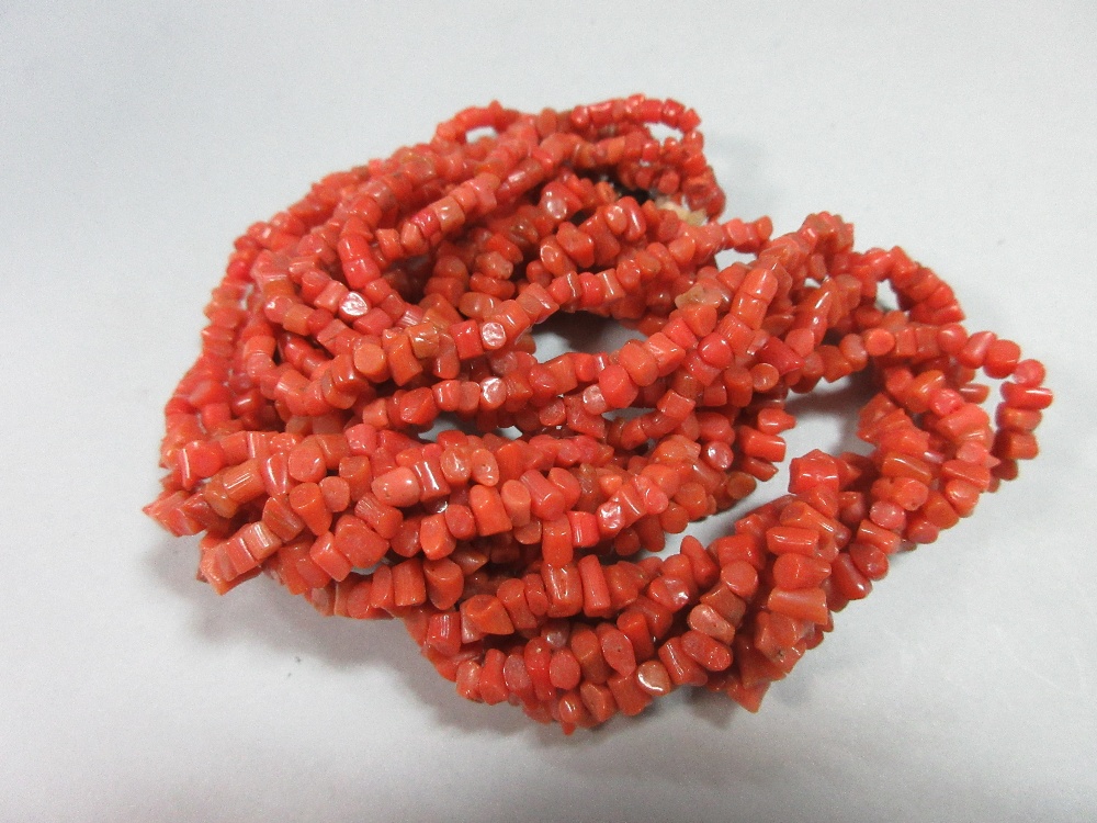 A vintage five strand coral bead necklace, each bead a short length of branch coral, graduated in - Image 3 of 3