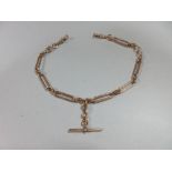 A rose gold double-ended watch chain, the fetter link chain with lobster clasps at both ends and a