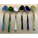 A set of six German silver gilt and enamel coffee spoons, retailed by and probably made by Eduard
