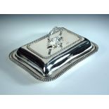 A silver entree dish and cover, by Alston's & Hallam, London 1916, of rectangular shape with