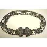 A Victorian lady's silver belt, by Samuel Jacob, London 1898, comprising a two piece cast openwork