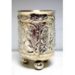 A Dutch silver beaker, .833, date letter for 1867, of cylindrical shape embossed with three panels