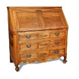 An 18th century French provincial walnut bureau, with two short and two long drawers, iron handles