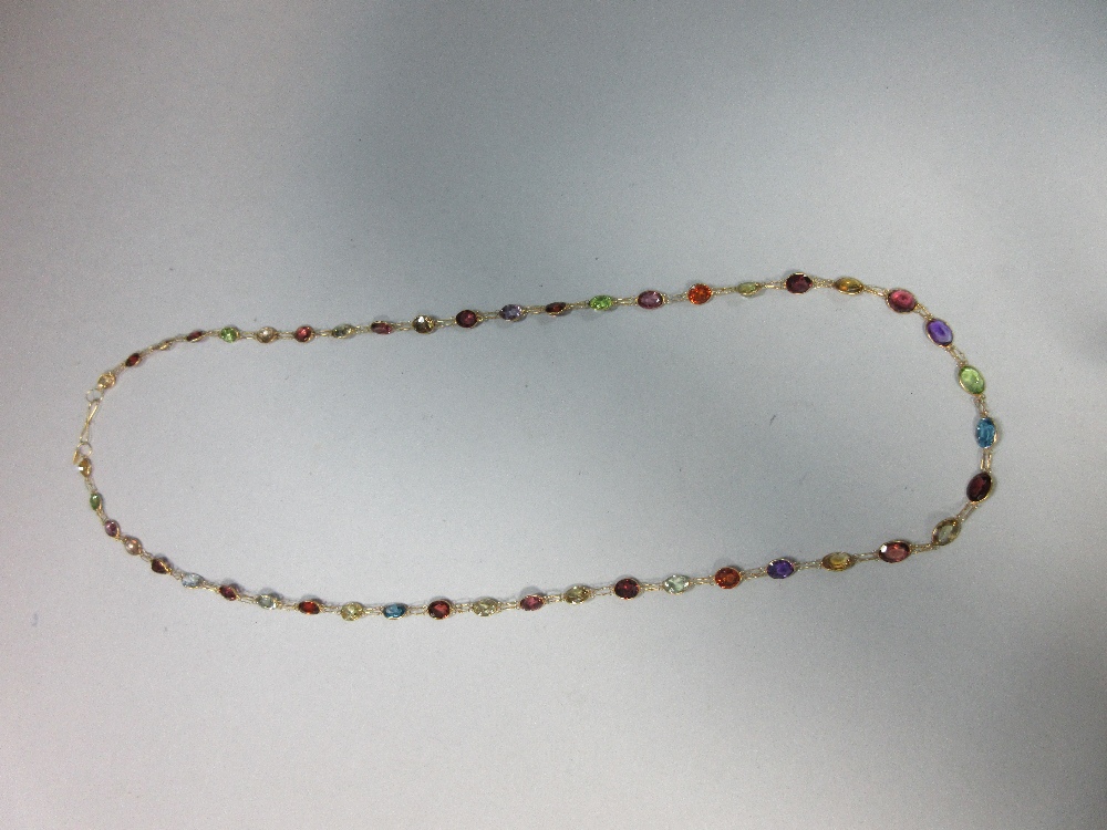 A multi-gemset chain necklace, spectacle set all along with graduated oval and round cut stones, - Image 3 of 4