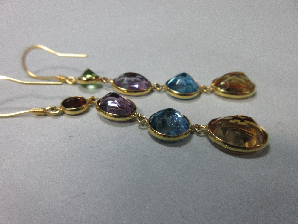 A pair of multi-gemset earpendants, each yellow precious metal wire hook suspending a graduated line - Image 3 of 3