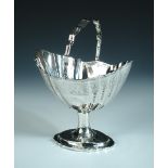 A George III Irish silver sugar basket, maker's mark indistinct, Dublin 1799, of navette form raised