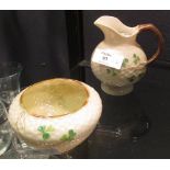 A Belleek creamer and sugar bowl