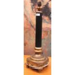 A gilt painted table lamp