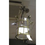 A brass and glass hanging lamp