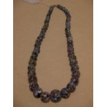 A graduated millefiori glass bead necklace
