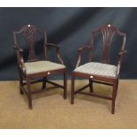 Two mahogany carvers with embroidered needlework seats (2) Provenance: Formerly the property of Mr