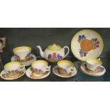 A Clarice Cliff crocus pattern teapot, four teacups, sugar bowl, six saucers, six side plates and