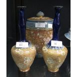 A Doulton stoneware 'Slaters' patent biscuit barrel and cover and a pair of Doulton stoneware bottle