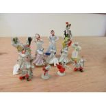 Thirteen Soviet porcelain figures of dancers, to include four similar by Dulevo and three by