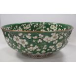 A Japanese bowl, blossom on a green ground