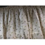 A pair of red toile cotton curtains, lined, 140cm drop x 80cm wide together with a pair of cream and