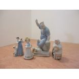 Four Soviet figurines featuring cats and a dog, the tallest of a chef rebuking a cat eating a stolen