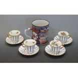 A Chinese export tankard and four blue and white striped and floral decorated teacups and saucers