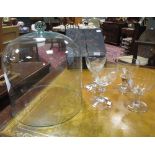 A glass domed cheese dish, together with four other glasses (5)