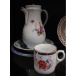 A continental hand painted coffee jug and a ceramic mug and three blue and white plates