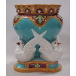 A Minton maiolica vase moulded with doves