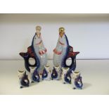 Two Polonnoe blue and red fish shaped decanters, stoppers and six shots (10)