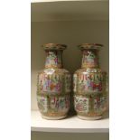 A pair of 19th century Canton vases, 36cm (14.25 in) high (2) The rims have been chipped and