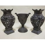 A pair of pierced brass vases and a cast iron goblet (3)