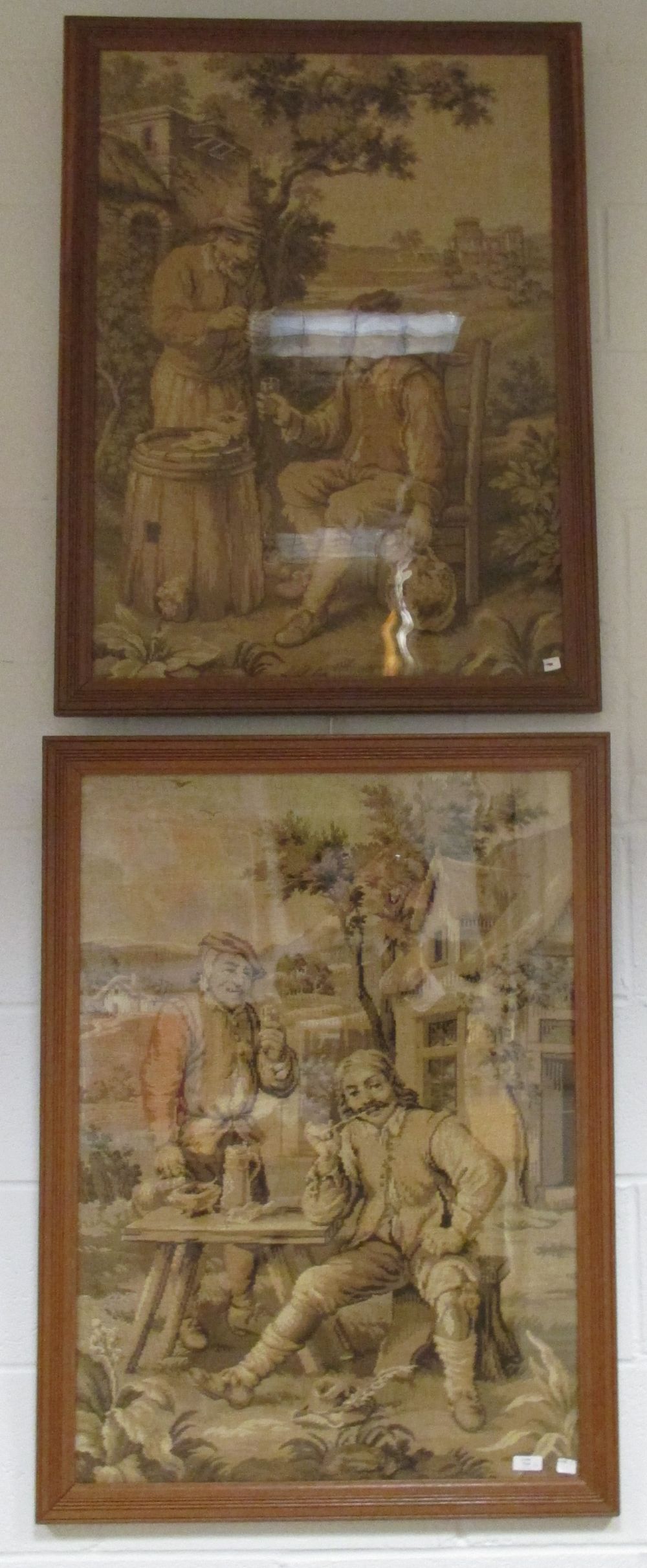 A set of four framed machine made tapestries