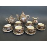 An early Satsuma part tea set