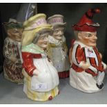 Two pairs of Punch and Judy Staffordshire Toby jugs (4)