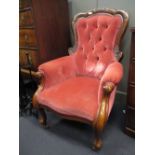 A Victorian mahogany button back armchair, together with a rocking chair (2)