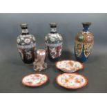 A pair of 20th century cloisonne enamel baluster shaped vases, together with another similar, a