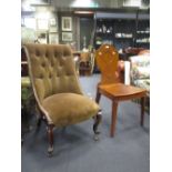 A Victorian mahogany hall chair, and an early Victorian button back easy chair (2)