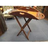 A mahogany butler's tray and stand