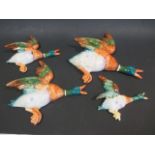 A graded set of four Beswick flying ducks