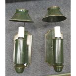 A pair of green toleware lamps