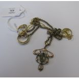 An Art Nouveau style moss agate pendant on later chain, an unmarked yellow metal Chinese anchor