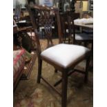 A set of eight mahogany Chippendale style dining chairs to include two carvers