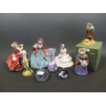 Three Royal Doulton figures - Autumn Breezes, Lady Charmain and Day Dreams; together with two