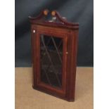 A corner cabinet, 72cm wide