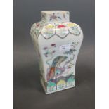 A Chinese famille rose vase of square sectioned baluster shape