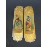 A pair of Regency papier mache painted door plates