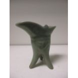 A Chinese celadon chueh, possibly 18th century, 9cm (3.5 in) high some wear to the glaze but no
