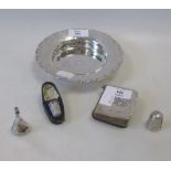 A small Mappin & Webb silver scale bordered dish, 14cm diameter, a silver miniature prayer book