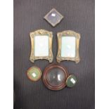 A pair of Art Nouveau brass frames and four others