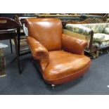 A leather upholstered armchair