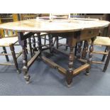 An 18th century oak gateleg dining table