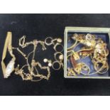 A quantity of 18ct and 9ct gold jewellery including a gold w/watch, various bracelets, earrings