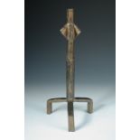 A patinated bronze candlestick, cast after a design by Diego Giacometti, signed to base 38½cm (15in)